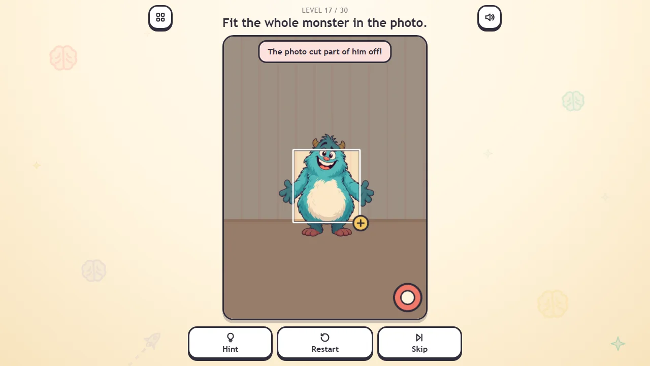 Scene seventeen: a fuzzy teal monster in front of a small white frame, a red shutter button at the lower right and a bubble saying the photo cut part of him off.