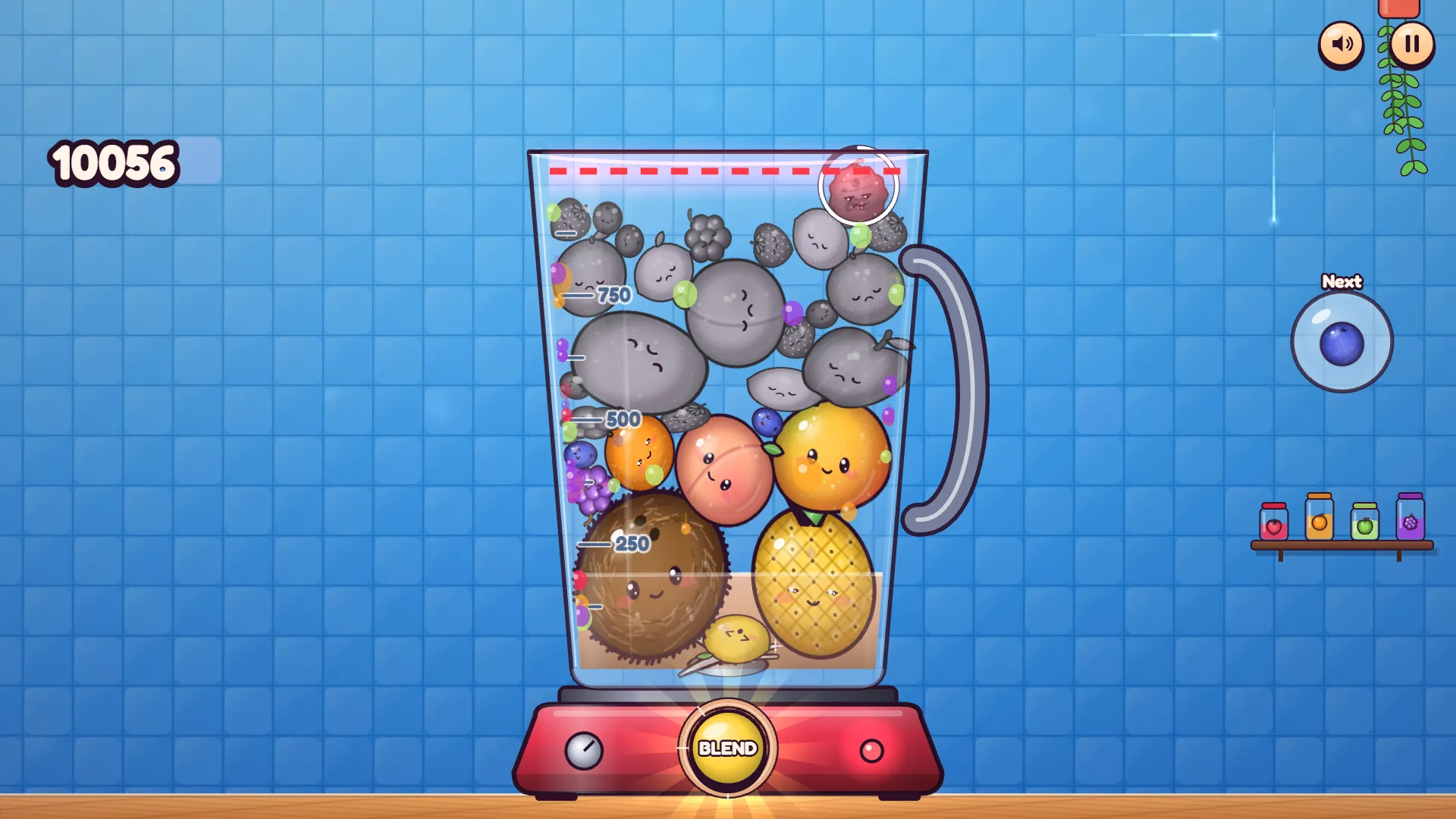 Game over in Plop! Fruit Merge, with the top fruits turned gray and a dashed red line at the rim of the glass