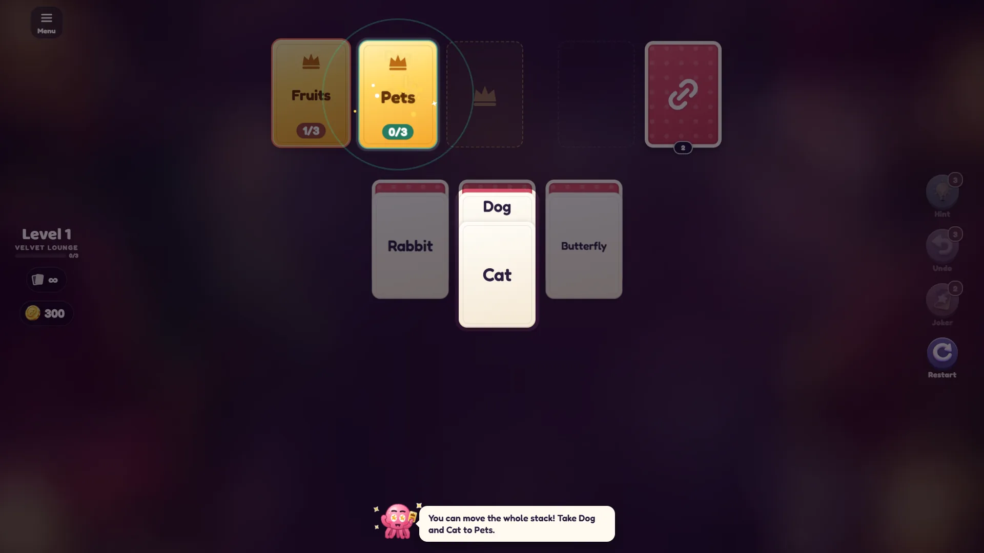 Dog and Cat stacked in a Solitaire Links column with the gold Pets card waiting at the top during the tutorial