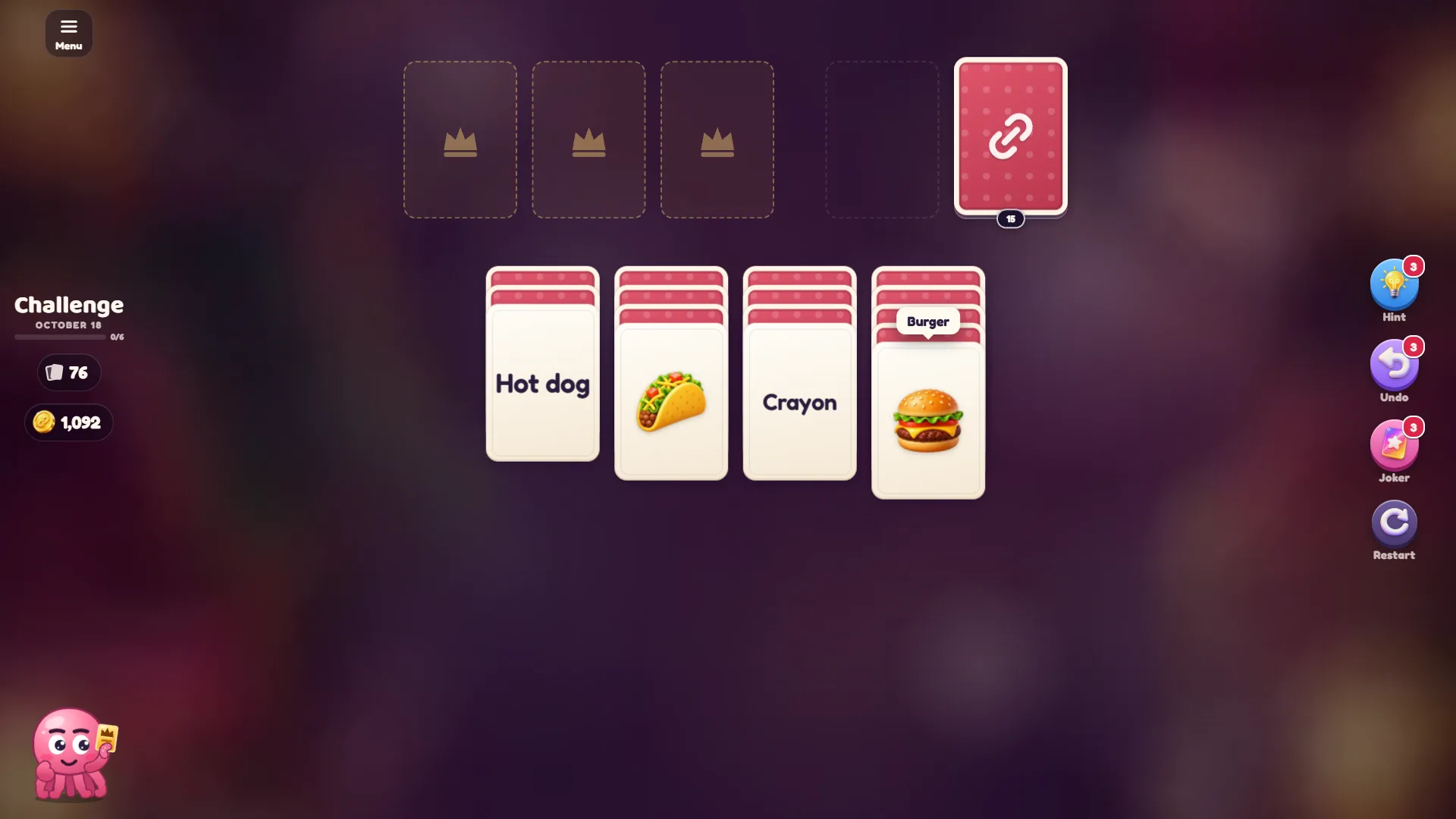 Solitaire Links daily challenge table with Hot dog, Crayon, a taco picture and a burger picture, with a Burger label showing while the card is held