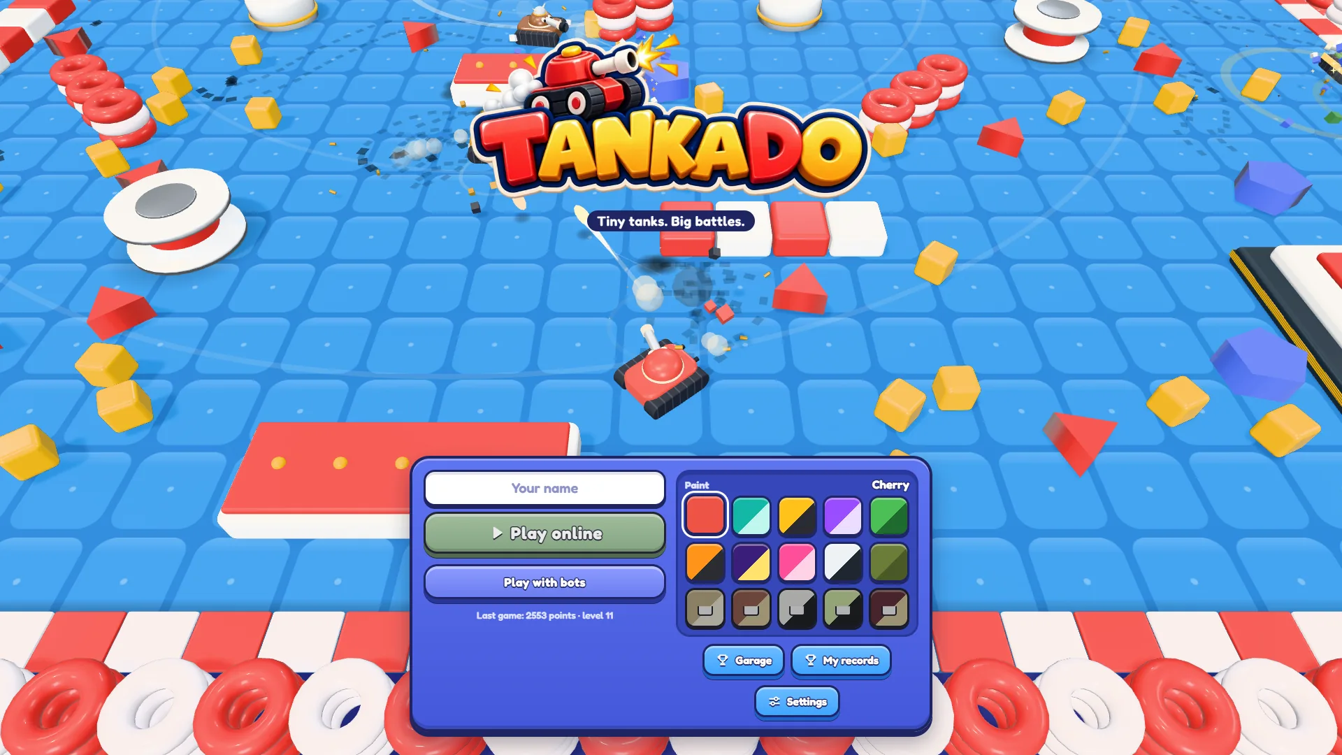 The Tankado menu with a name box, Play online and Play with bots buttons, fifteen paint swatches and Garage, My records and Settings buttons, over a tiled toy arena