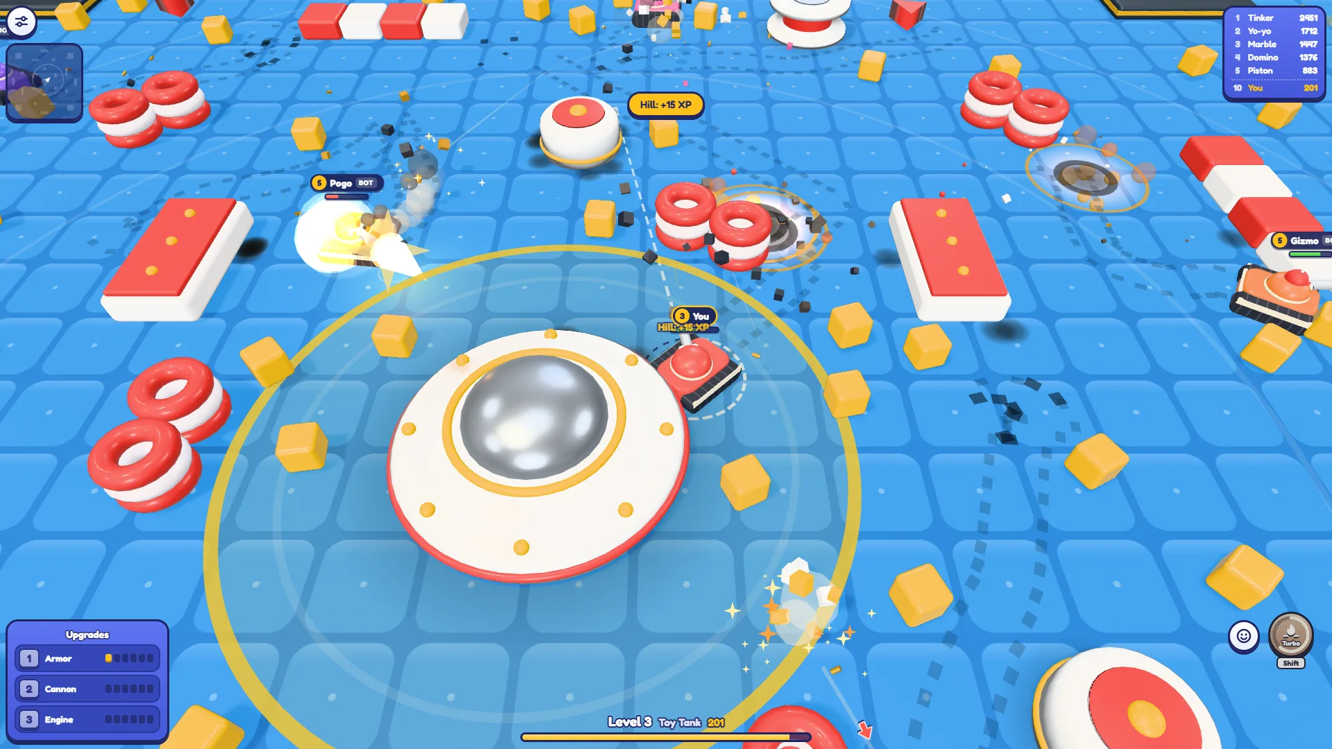 Tankado at level 3 standing in the yellow ring around the central saucer platform with a Hill plus 15 XP popup
