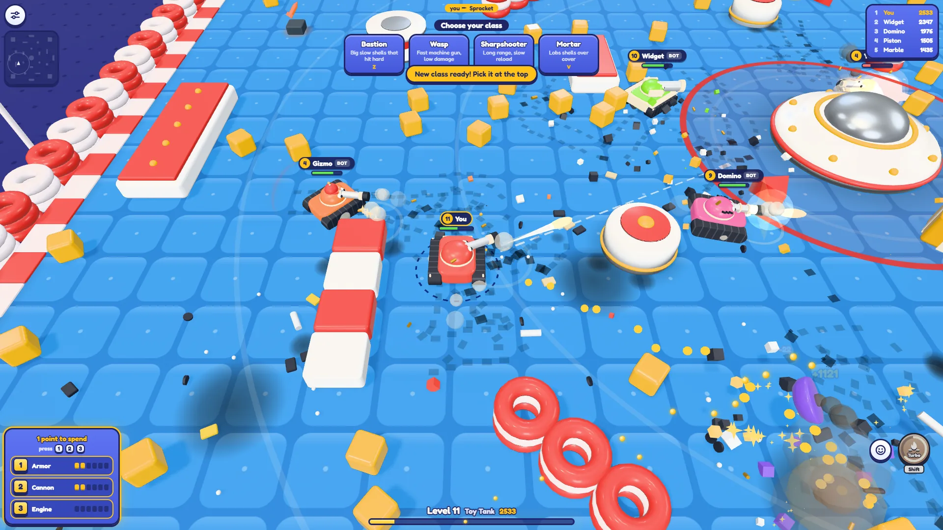 Tankado at level 11 with the Choose your class cards Bastion, Wasp, Sharpshooter and Mortar, a +1121 popup fading near a wrecked tank and the scoreboard showing my name first