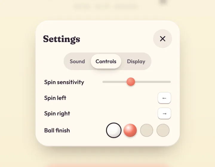 Twirldrop settings, Controls tab: a Spin sensitivity slider, Spin left and Spin right keys with arrow symbols and four round ball finish swatches