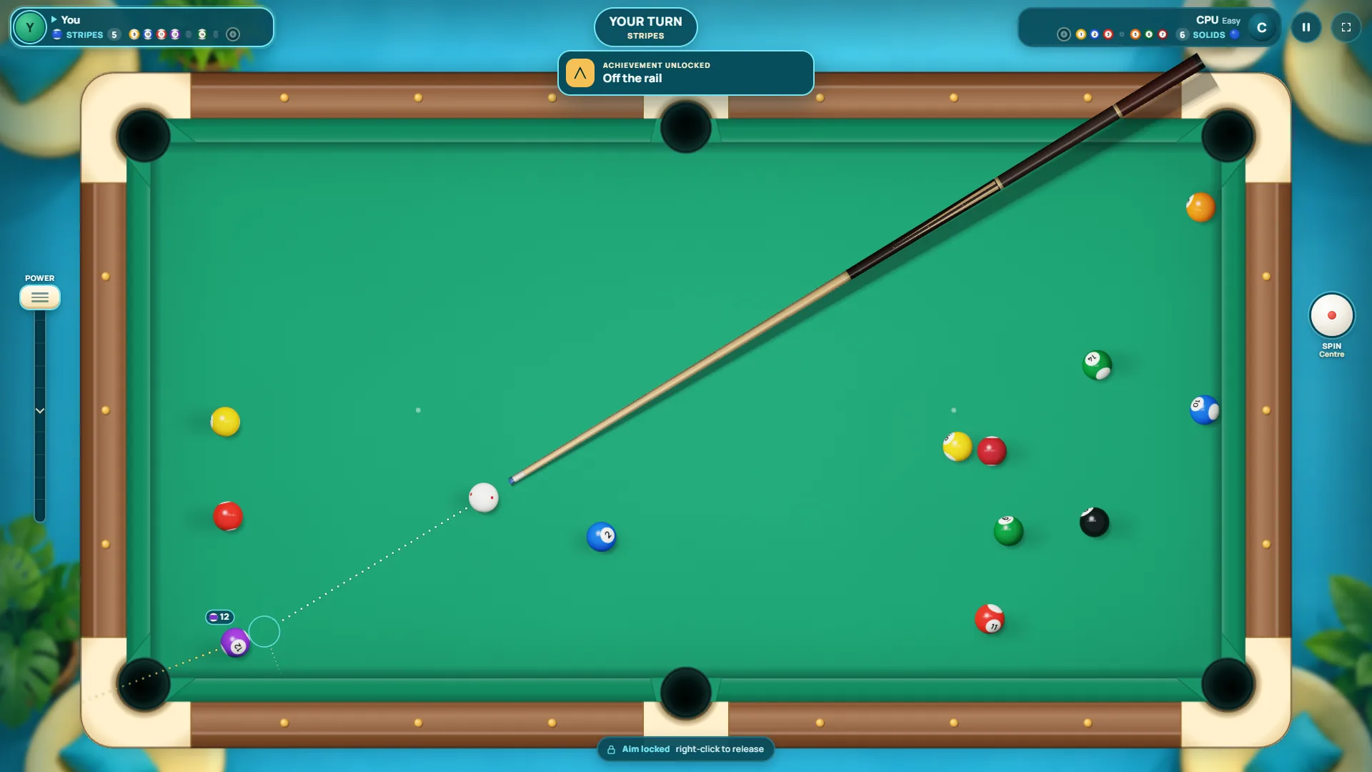 Locked aim in Velvet Pool: a dotted line from the cue ball to an empty contact circle next to the 12 ball, with the 12's path to the corner pocket.
