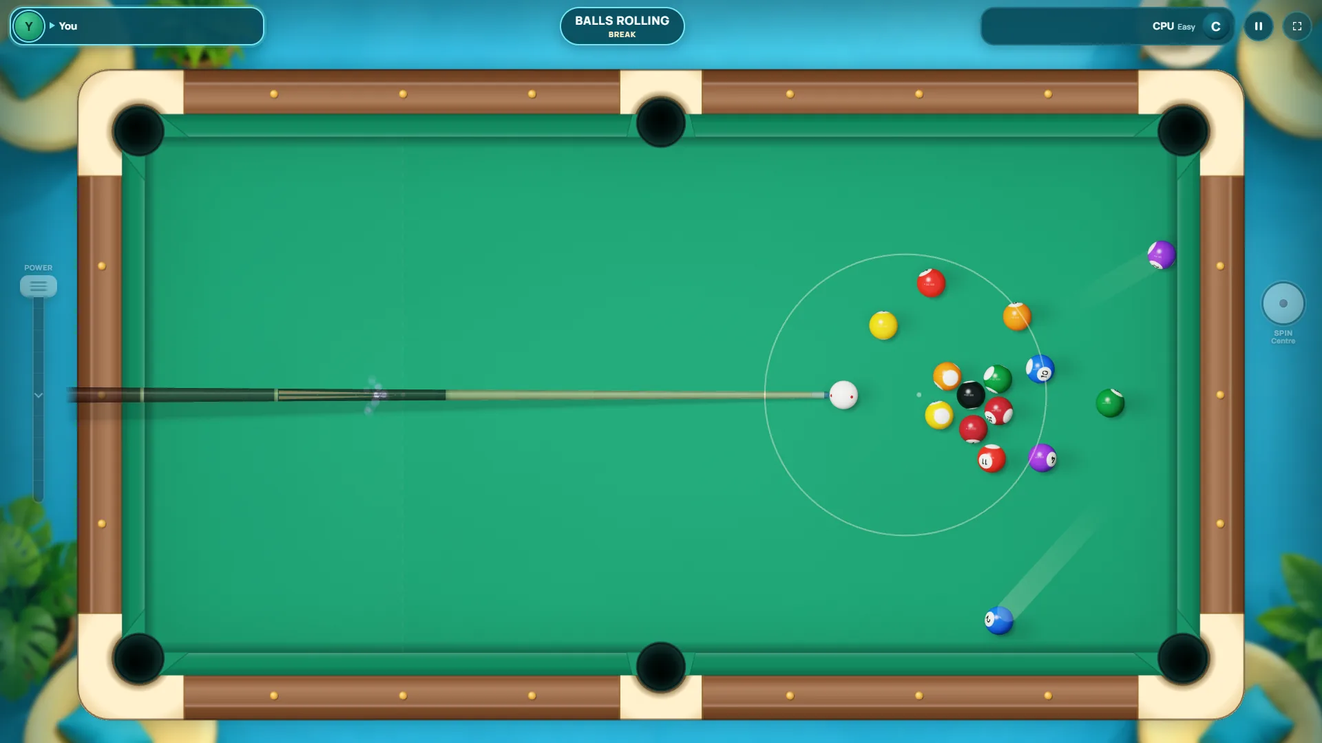 The opening break in Velvet Pool: the cue ball has just hit the rack and the colored balls are spreading across the green table.